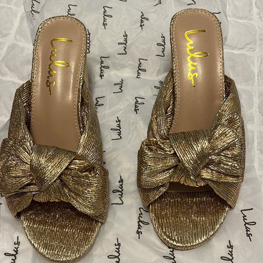 Lulu’s gold heels